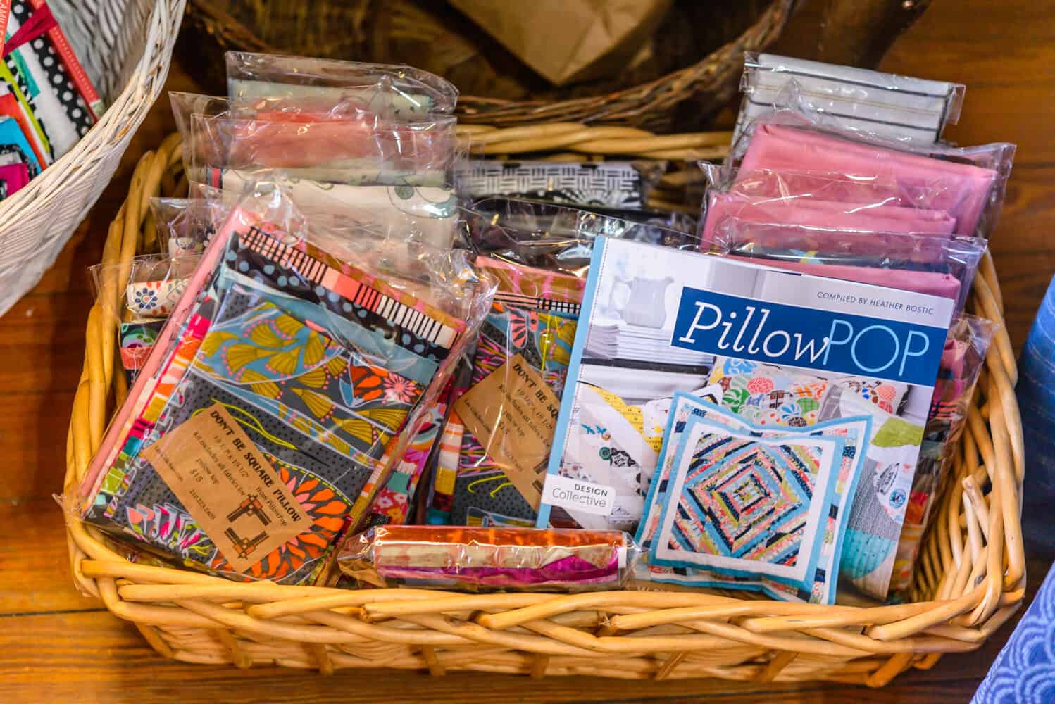 Basket of quilting kits and patterns at Las Colchas in San Antonio