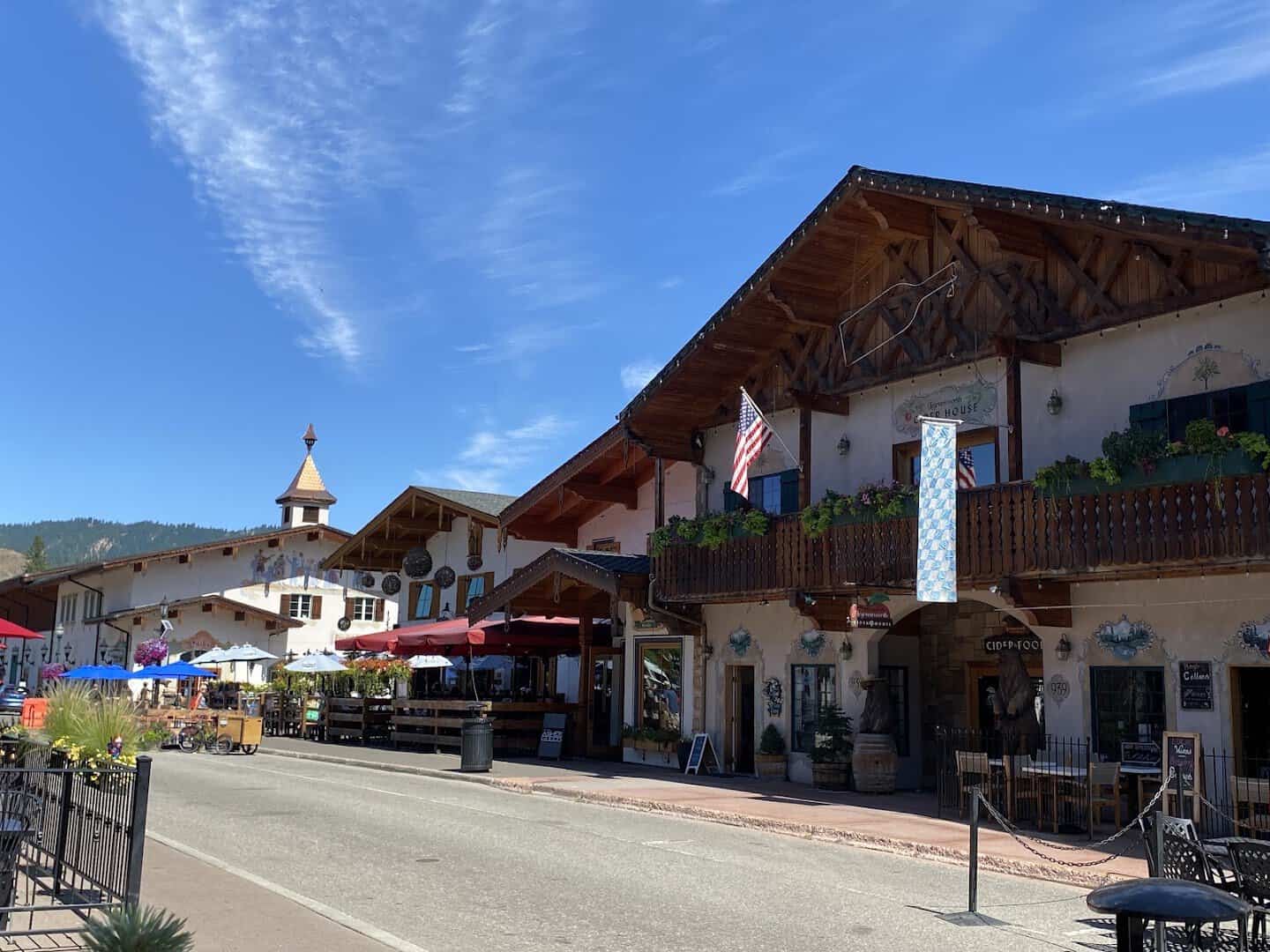 Bavarian street with beer-garden umbrellas in Leavenworth, Washington during fall Oktoberfest