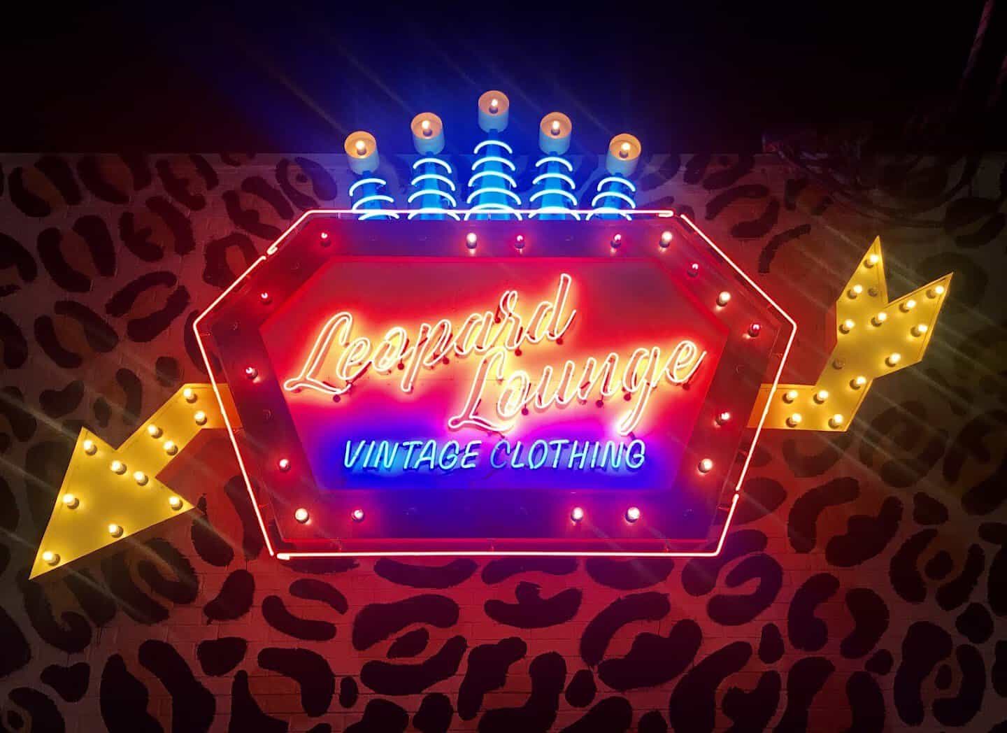 Neon Leopard Lounge sign at the vintage store in Houston