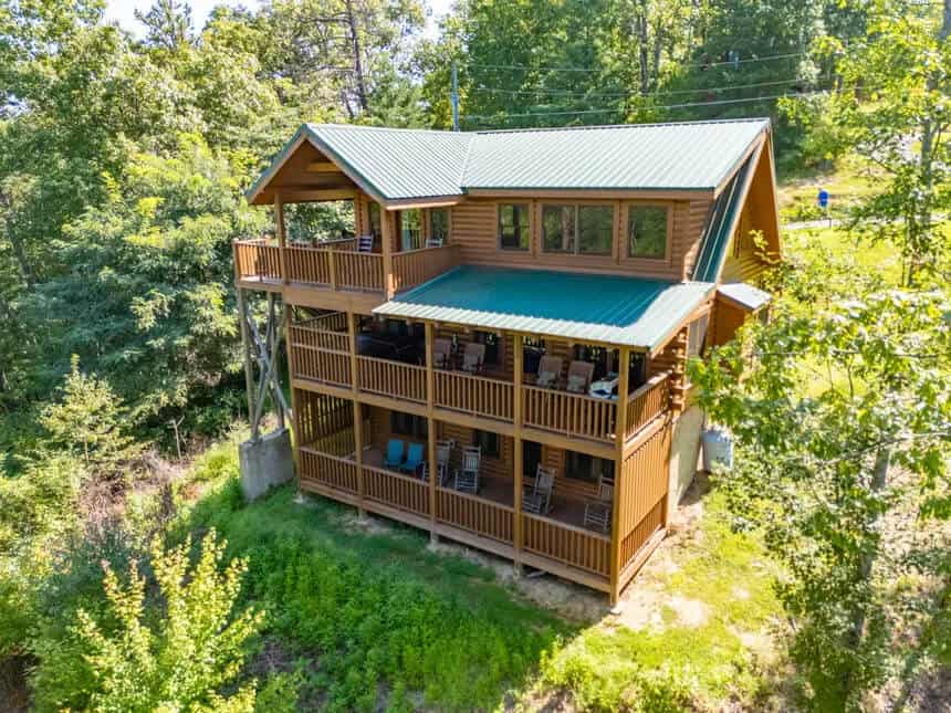 Multi-level log cabin exterior at Little Valley Mountain Resort near Pigeon Forge, Tennessee