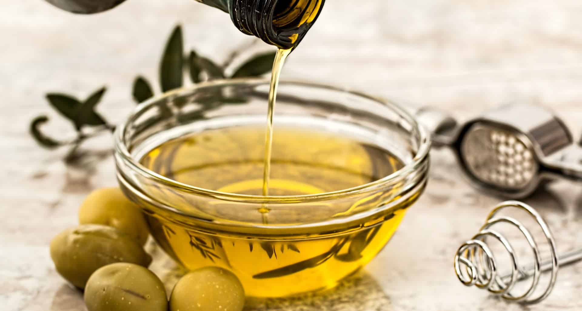 Locally pressed olive oil and olives at Barton Creek Farmers Market in Austin, Texas