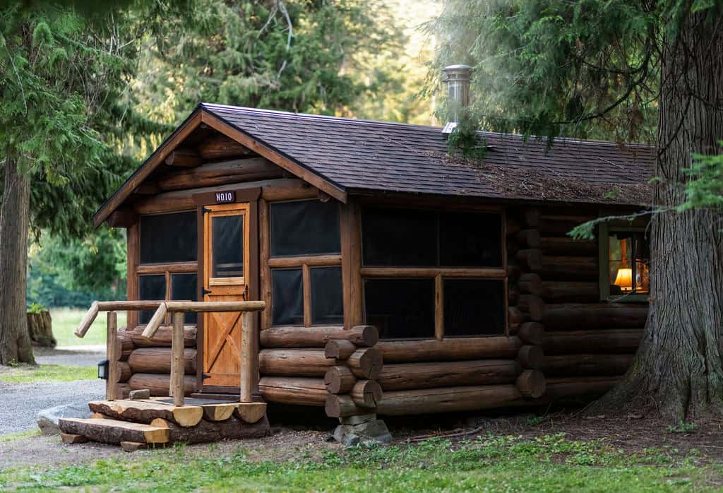 Log cabin among firs at Lochsa Lodge in the Clearwater National Forest, Idaho