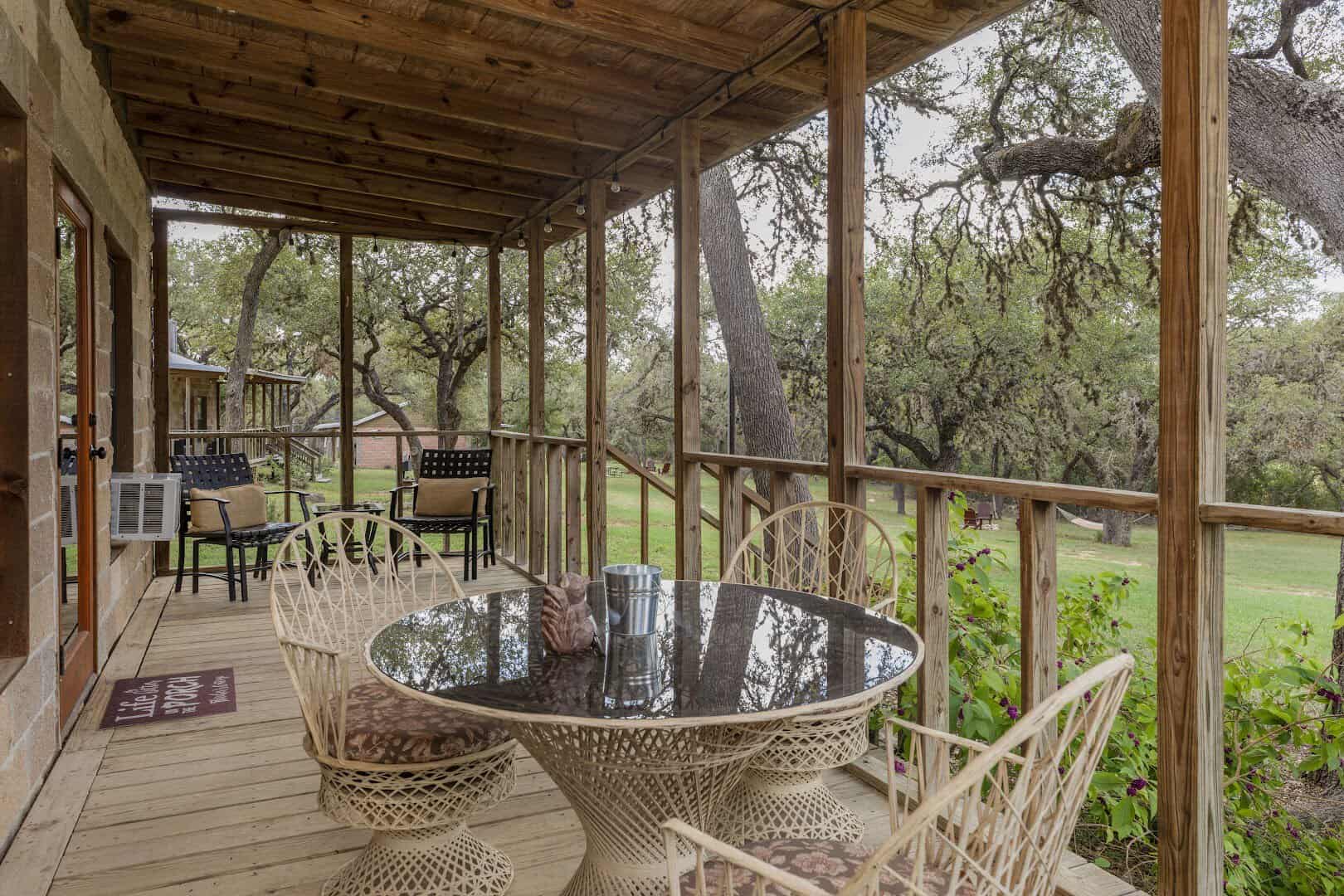 Screened porch overlooking the Hill Country at The Lodges at Lost Maples in Vanderpool, Texas