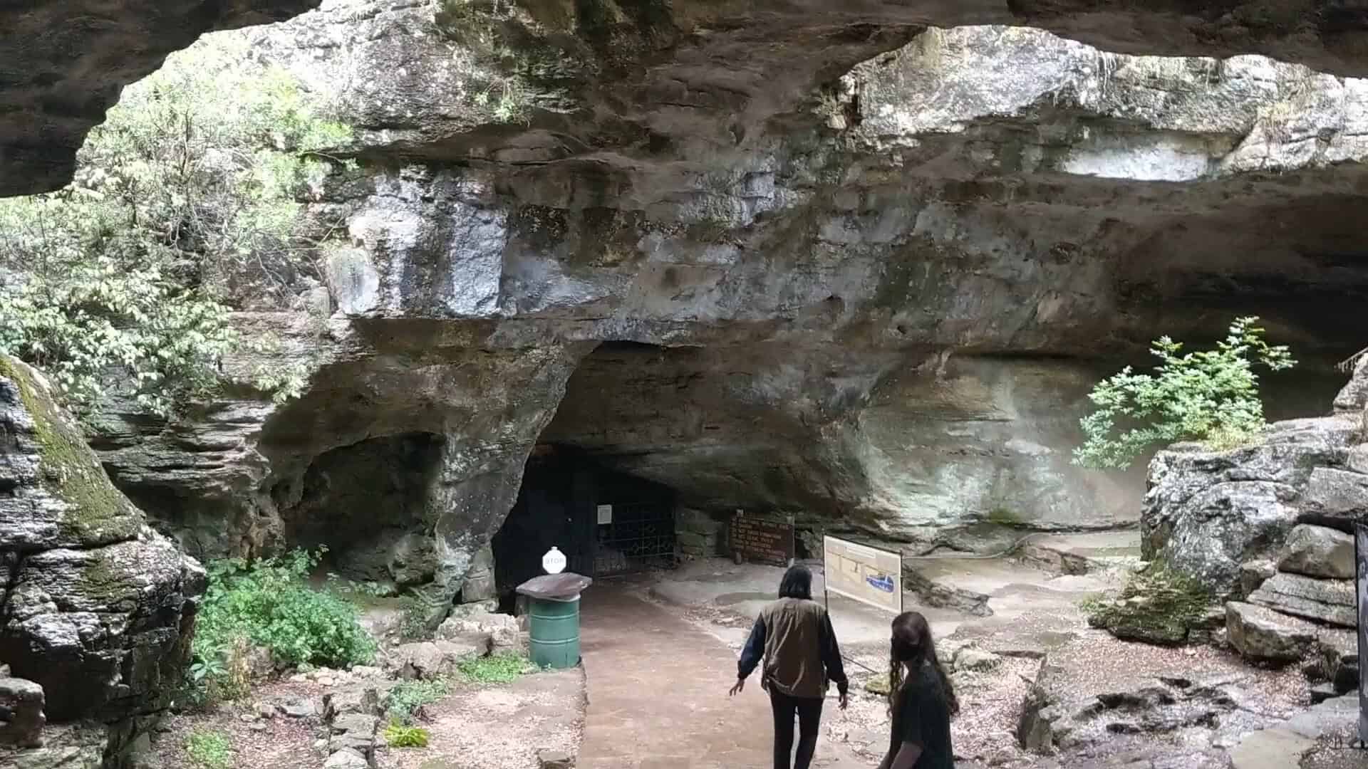 Visitors approaching the main cave entrance at Longhorn Cavern State Park, Texas