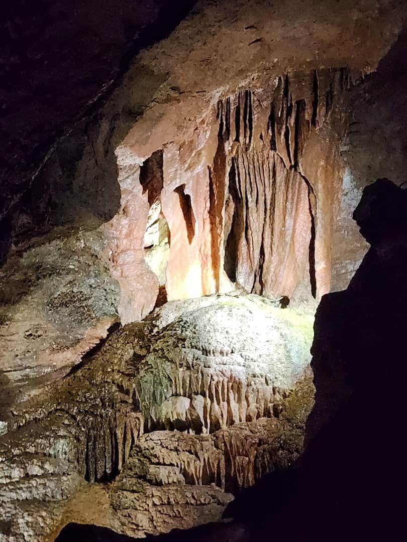 Lit flowstone formations inside the Lost Sea caverns, Sweetwater, Tennessee