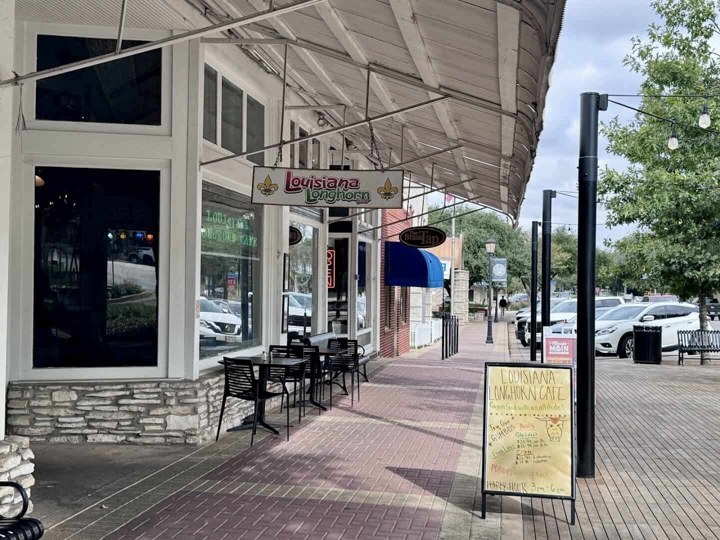 Storefront of Louisiana Longhorn Cafe on East Main Street in downtown Round Rock, Texas