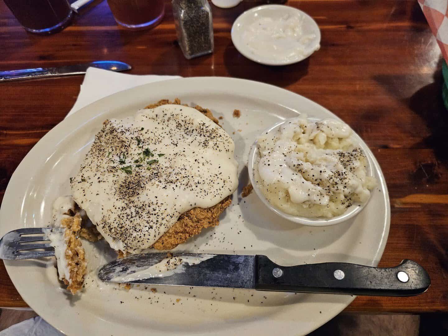 Chicken fried steak with cream gravy and mashed potatoes at Louisiana Longhorn Cafe in Round Rock, Texas