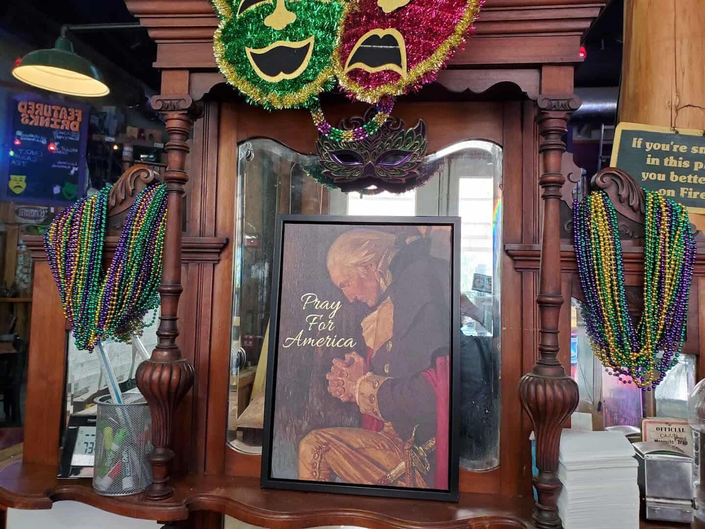 Mardi Gras beads and bayou decor inside Louisiana Longhorn Cafe in Round Rock, Texas