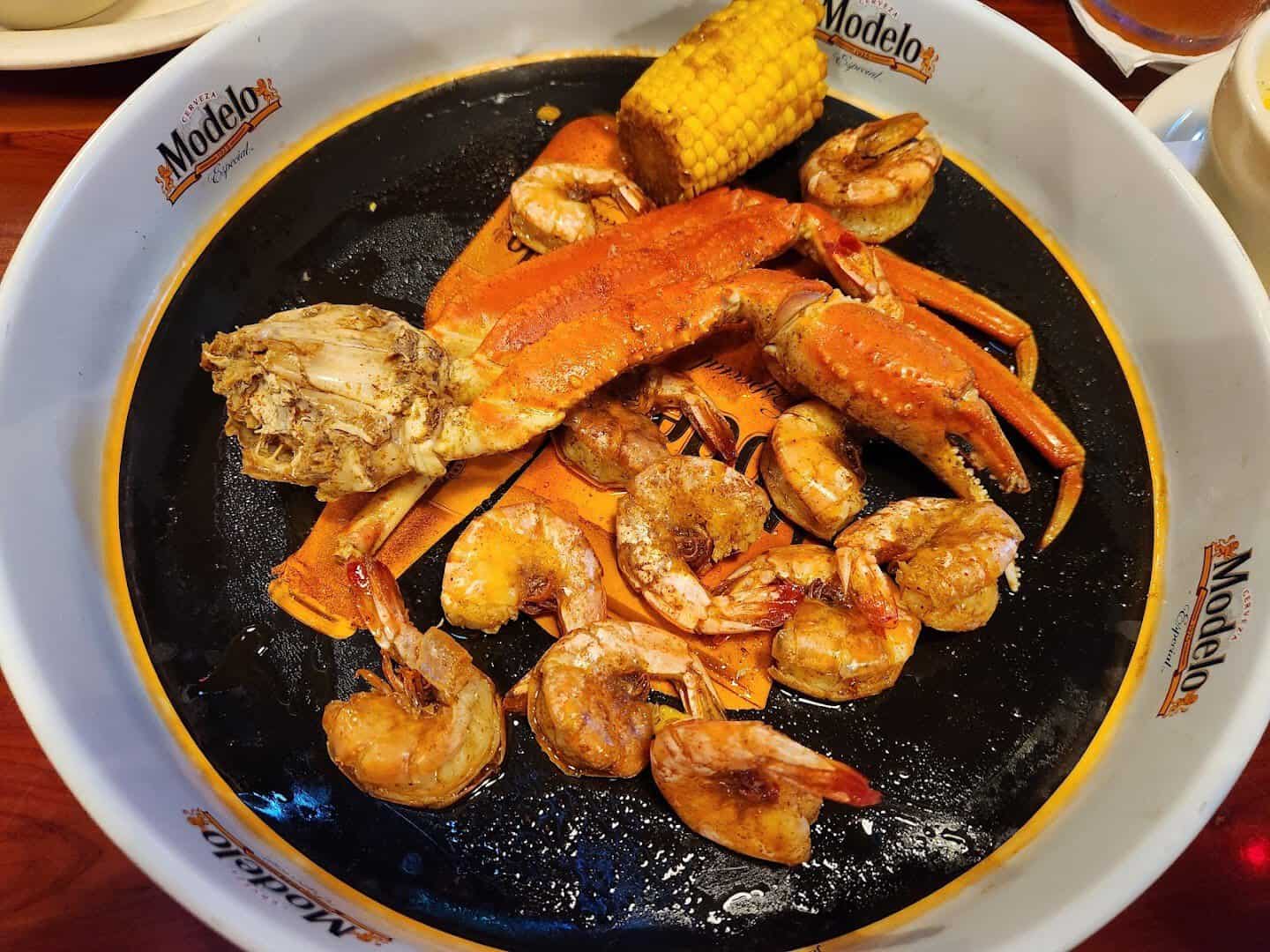 Seafood boil with snow crab, shrimp and corn at Louisiana Longhorn Cafe in Round Rock, Texas
