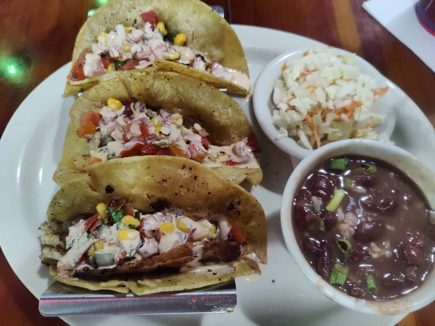 Seafood tacos with coleslaw and red beans at Louisiana Longhorn Cafe in Round Rock, Texas