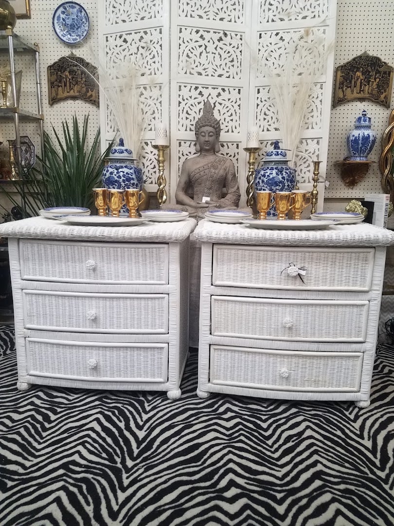 A curated vendor booth of vintage furniture and decor at Lula B's Design District in Dallas