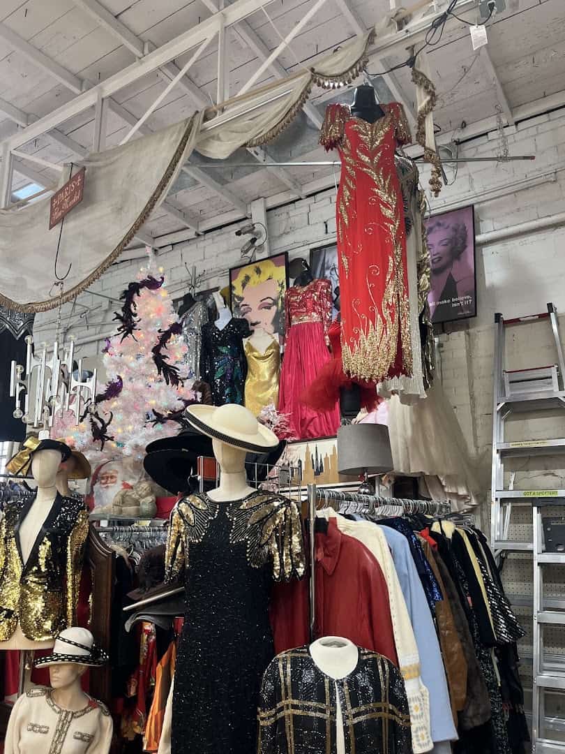 Racks of vintage clothing and hats at Lula B's Design District in Dallas
