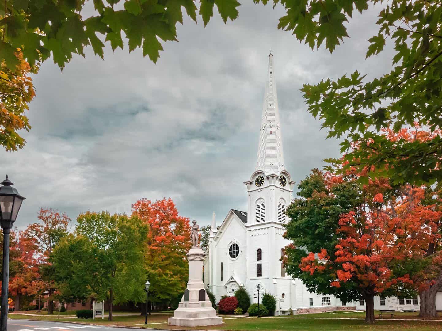 White church and fall foliage in Manchester Village, Vermont