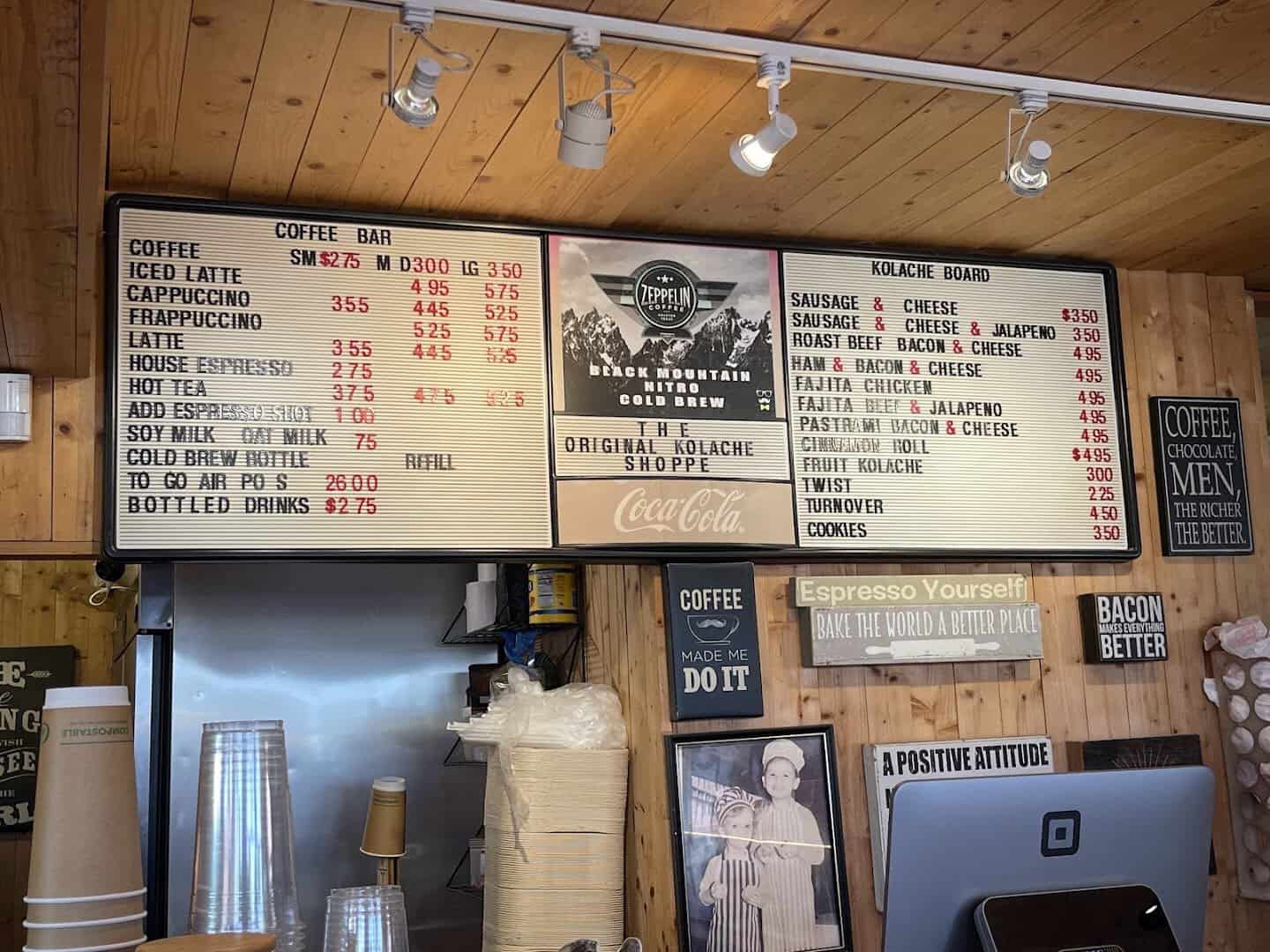 The kolache and coffee menu board at The Original Kolache Shoppe in Houston