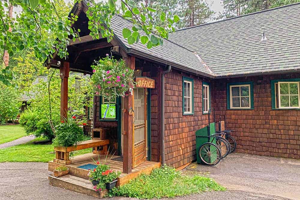 Cabin surrounded by forest at Metolius River Resort in Camp Sherman, Oregon