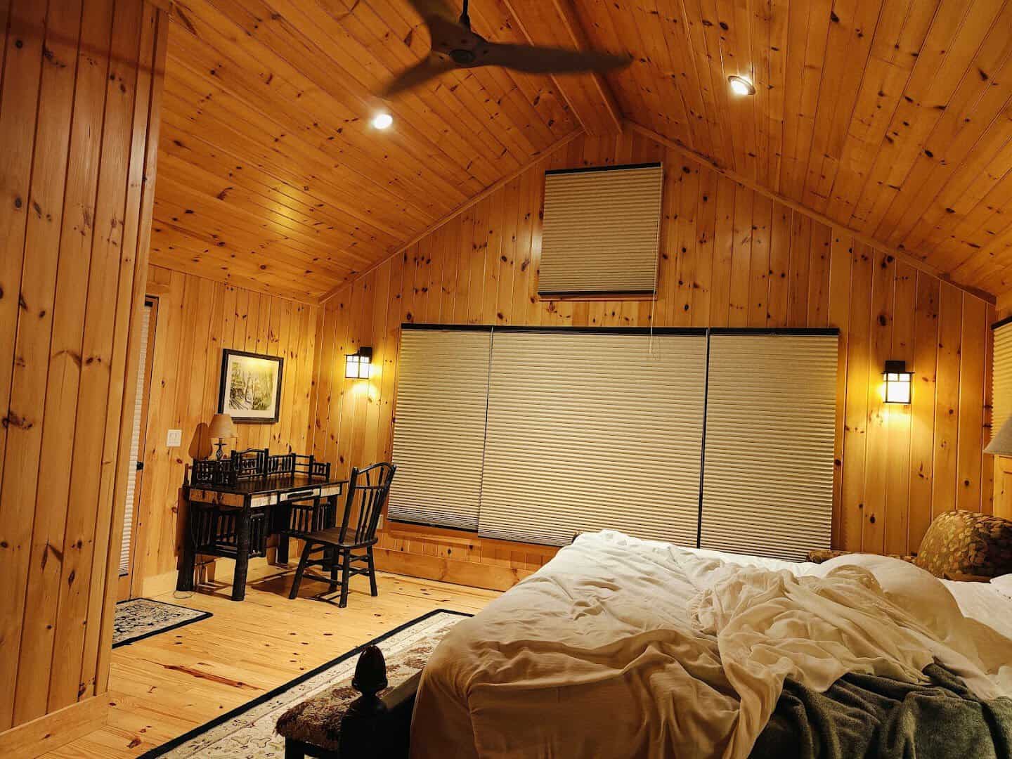 Cozy pine cabin interior at Migis Lodge on Sebago Lake, Maine