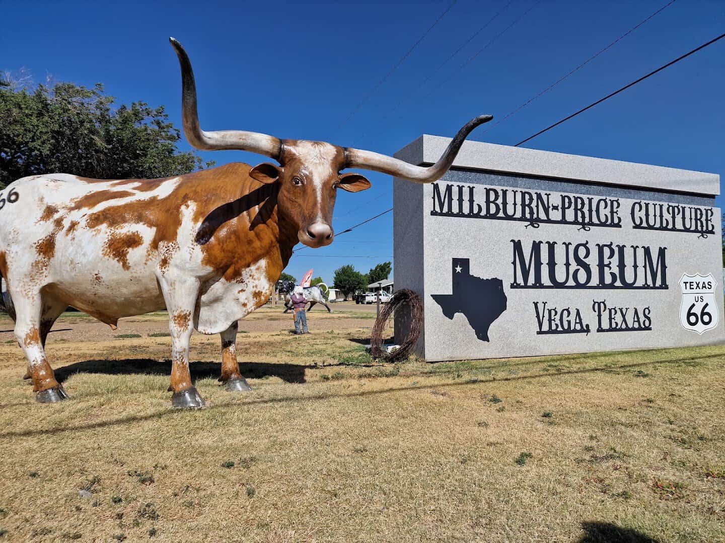 Milburn-Price Culture Museum and longhorn statue in Vega, Texas