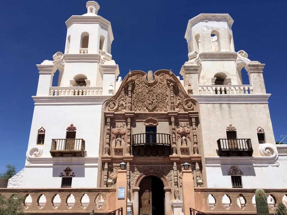 Ornate white facade of Mission San Xavier del Bac near Tucson, Arizona
