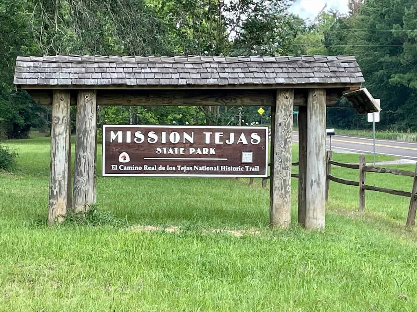 Mission Tejas State Park entrance sign along State Highway 21 in Grapeland, Texas
