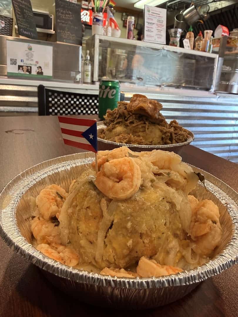 Mofongo con mariscos topped with shrimp at Tex-Chick in Houston
