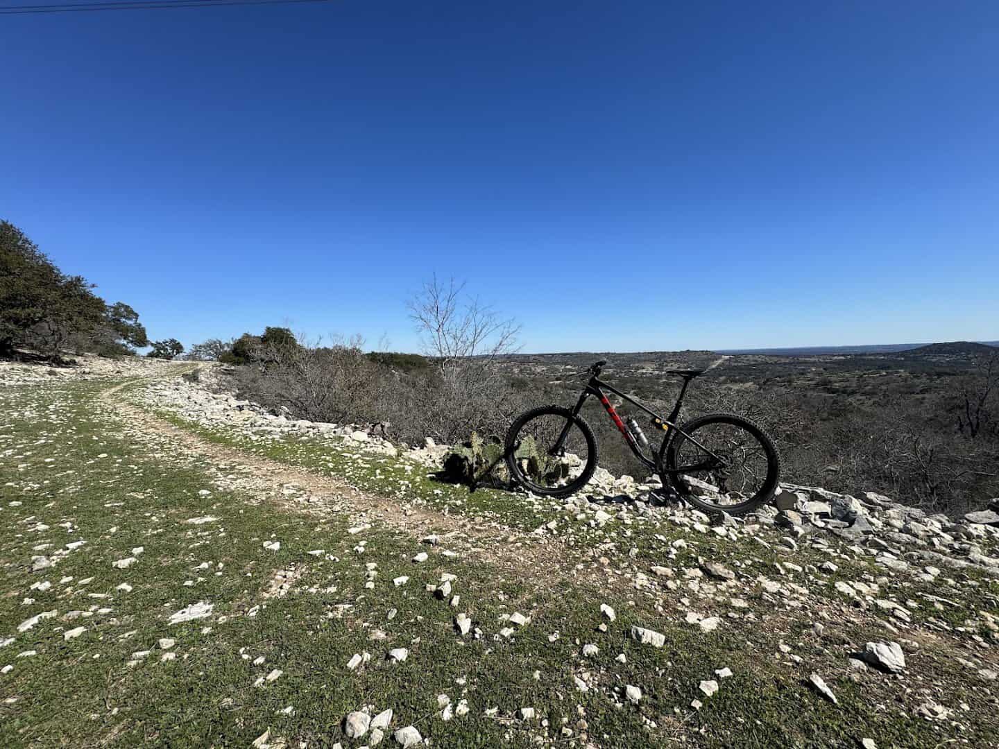 Mountain bike on an exposed rocky ridgeline at Flat Rock Ranch in the Texas Hill Country