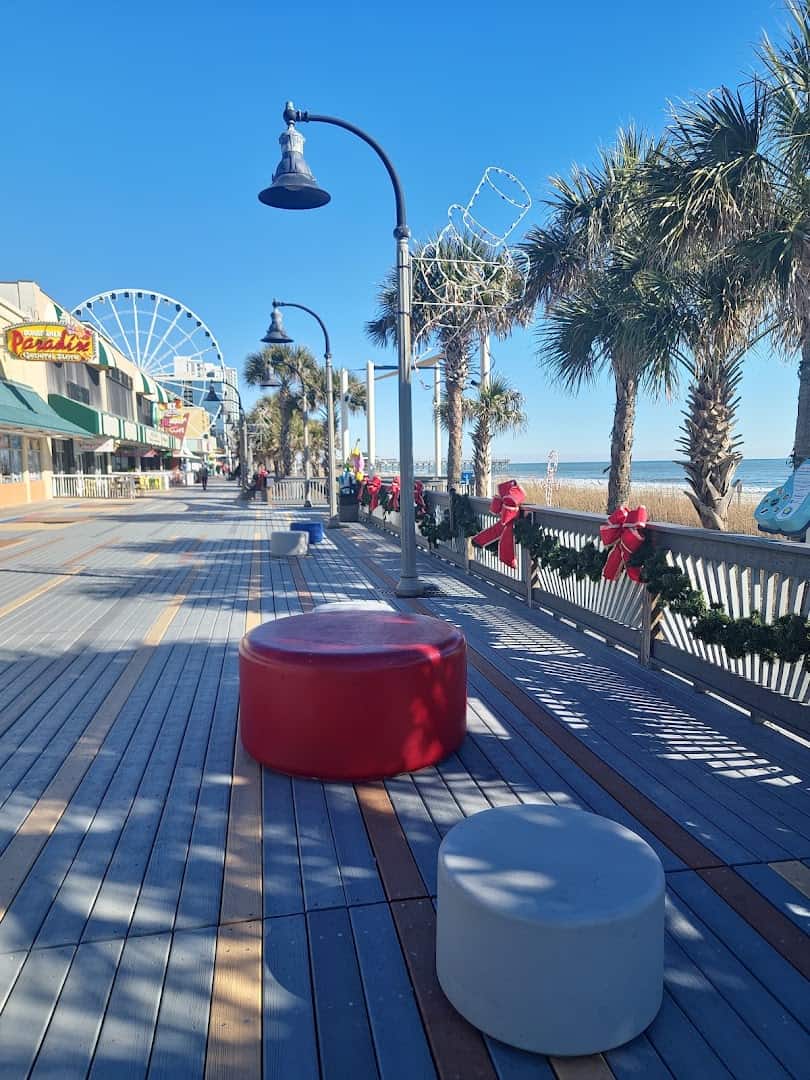 Myrtle Beach Boardwalk with the SkyWheel and shops in Myrtle Beach, South Carolina