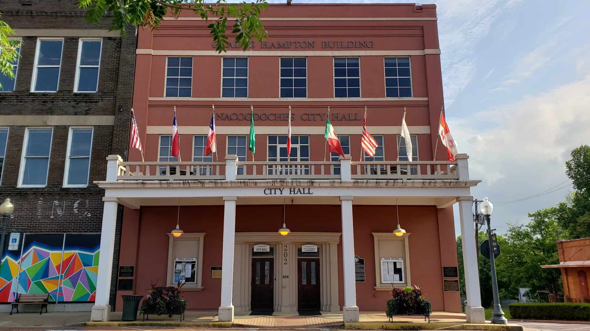 Nacogdoches City Hall flying flags in downtown Nacogdoches, Texas