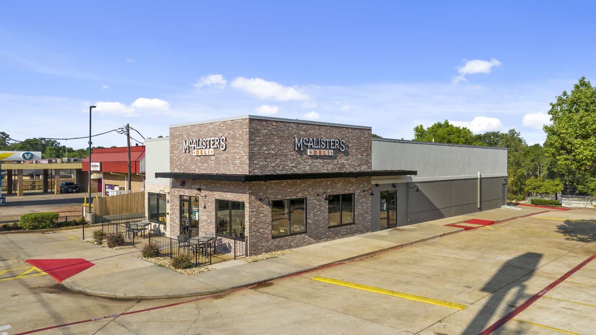 Locally owned shops along a brick street in downtown Nacogdoches, Texas