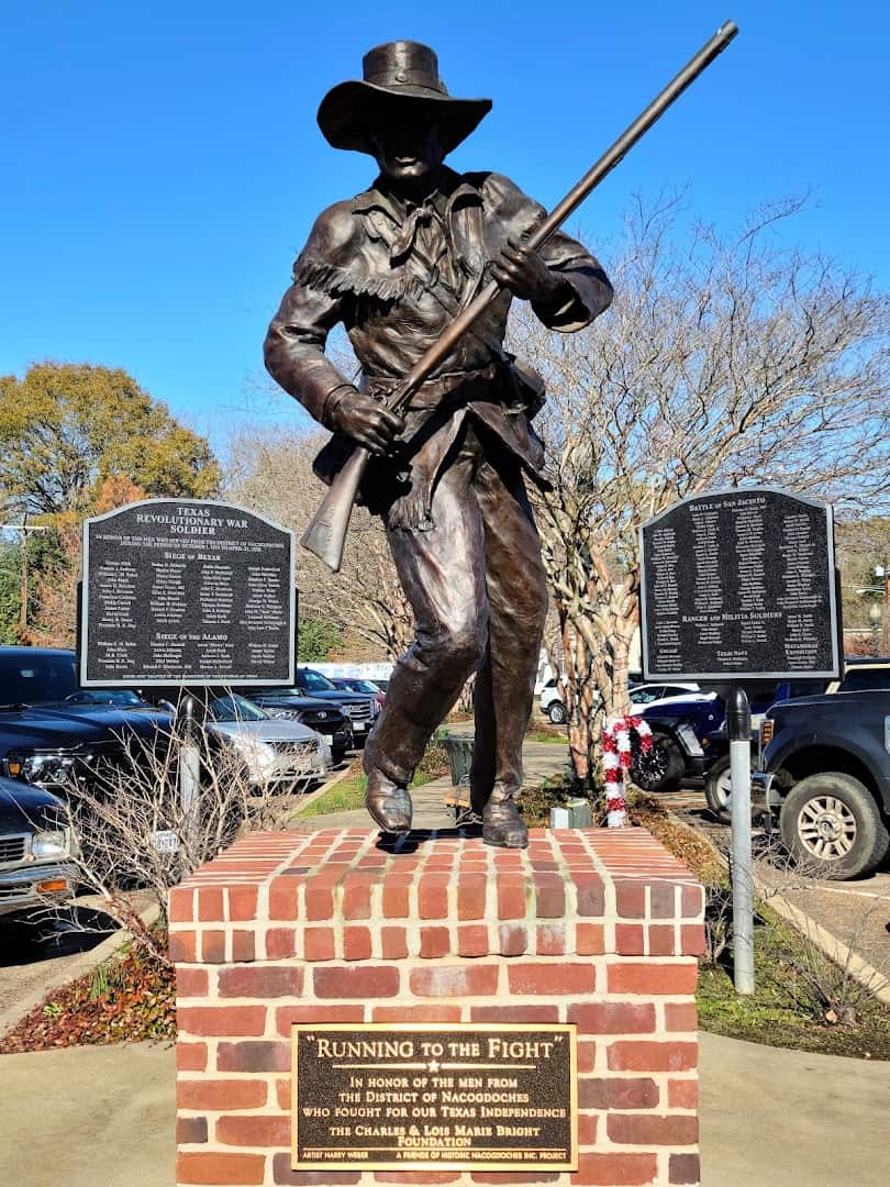 Bronze statue and historical markers in downtown Nacogdoches, Texas