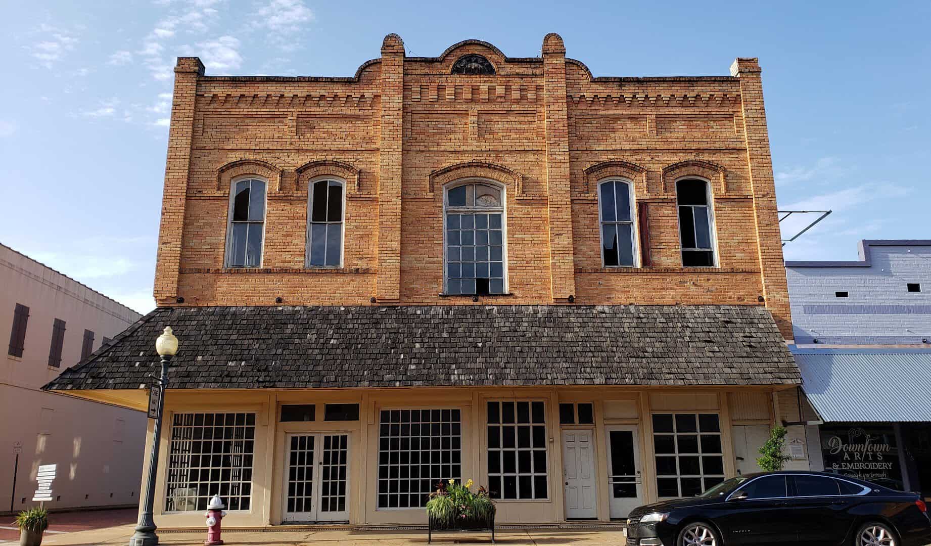 Historic brick storefront in downtown Nacogdoches, Texas