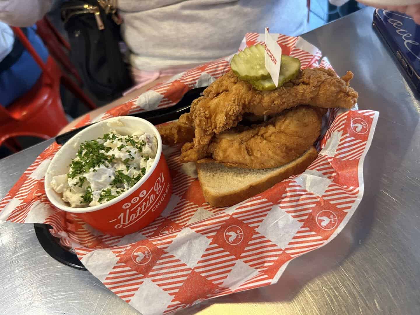 Nashville hot chicken with pickles at Hattie B's in Nashville, Tennessee