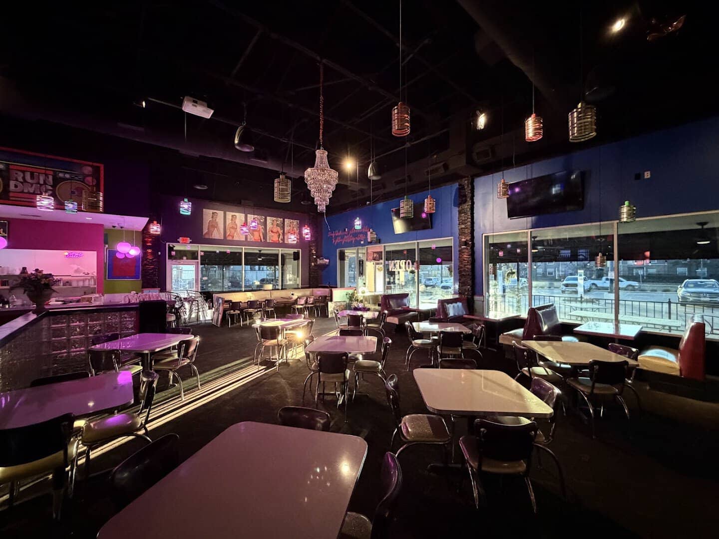 Neon-lit dining room at Hungry Like The Wolf in Houston