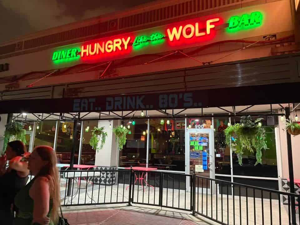 Neon storefront sign at Hungry Like The Wolf in Houston