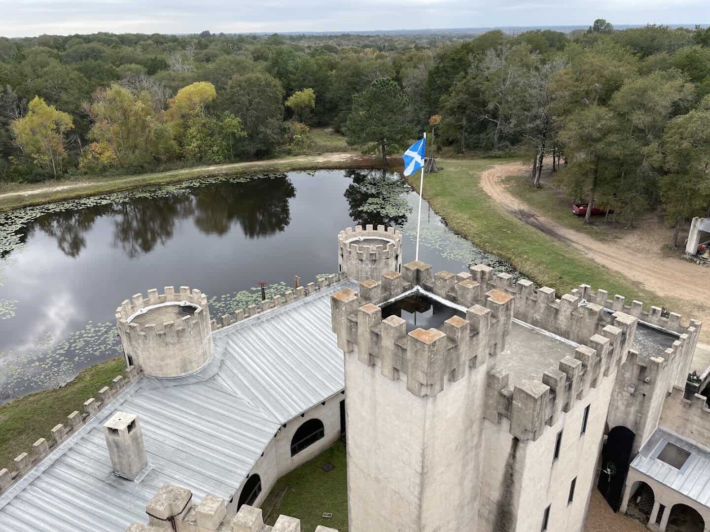 Aerial view of the rooflines and towers of Newman's Castle in Bellville, Texas