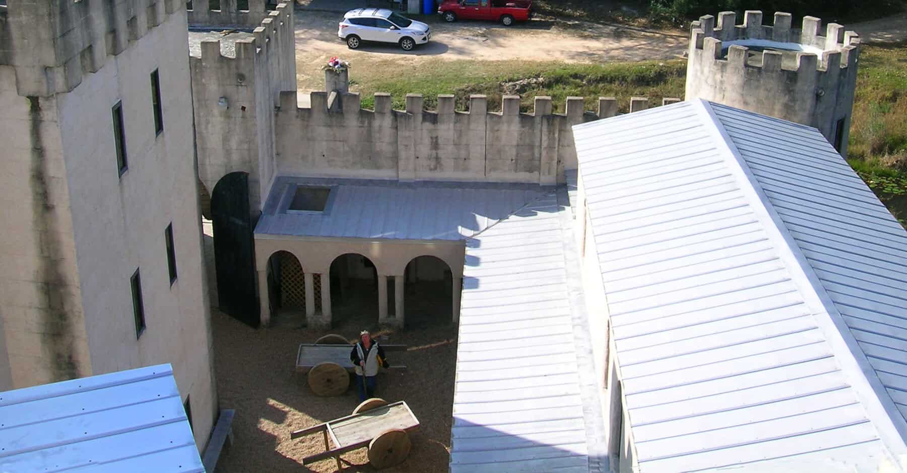 Aerial view of the stone battlements and courtyard of Newman's Castle near Bellville, Texas