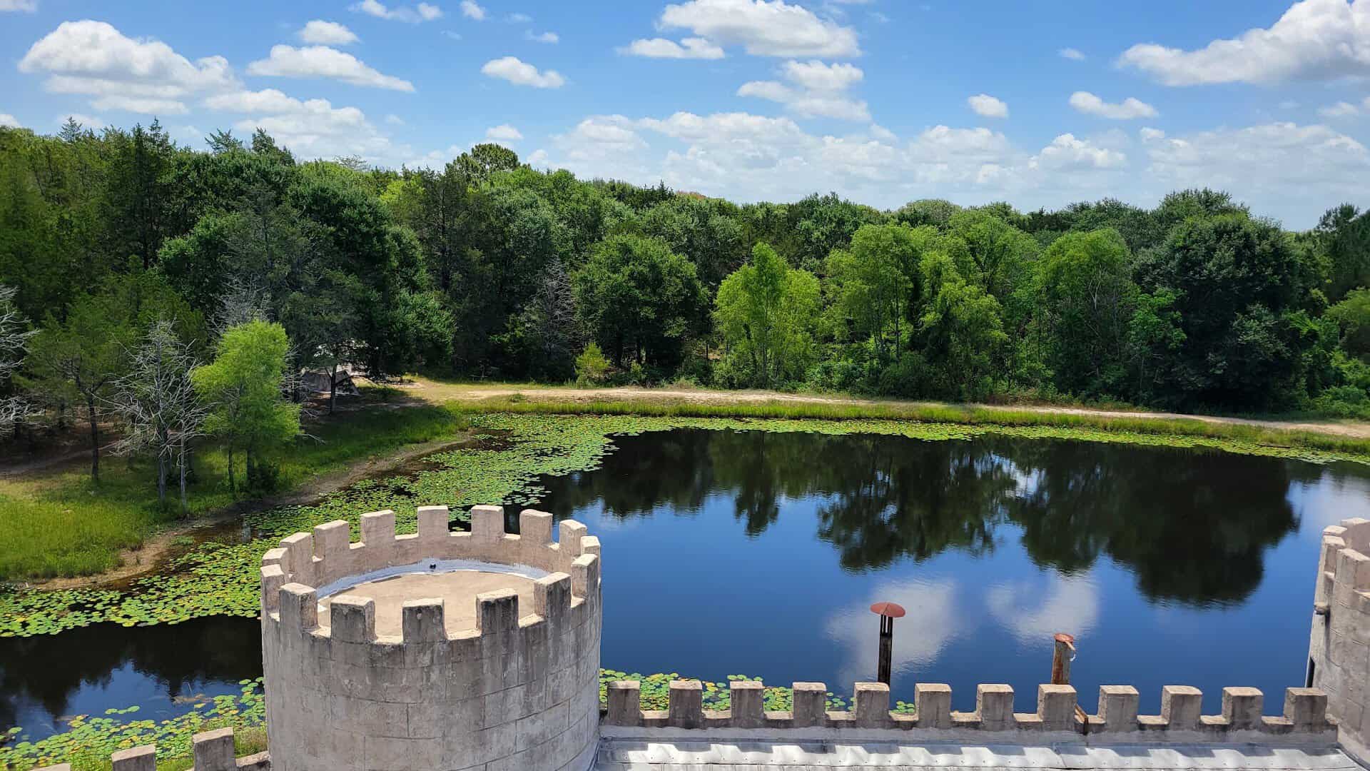 A corner turret of Newman's Castle above the water near Bellville, Texas