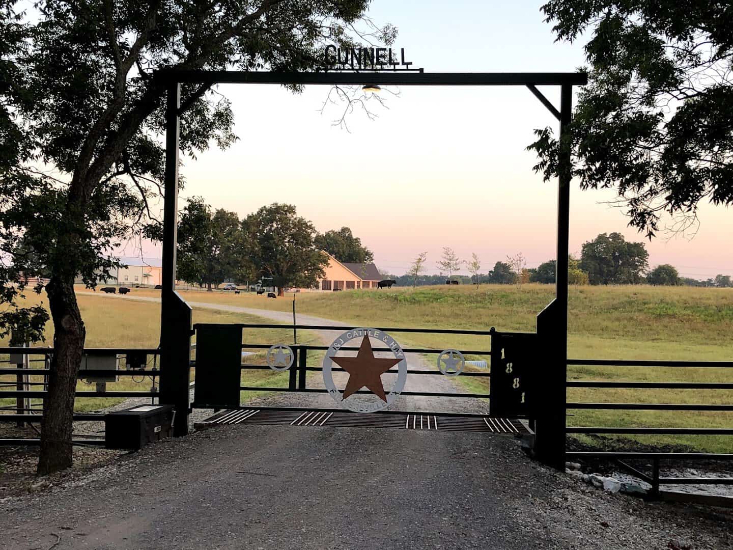 Trailhead gateway arch at sunset on the Northeast Texas Trail in Farmersville