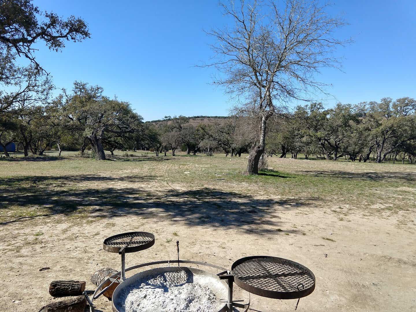 Live oaks and open Hill Country ranch land at Flat Rock Ranch in Comfort, Texas