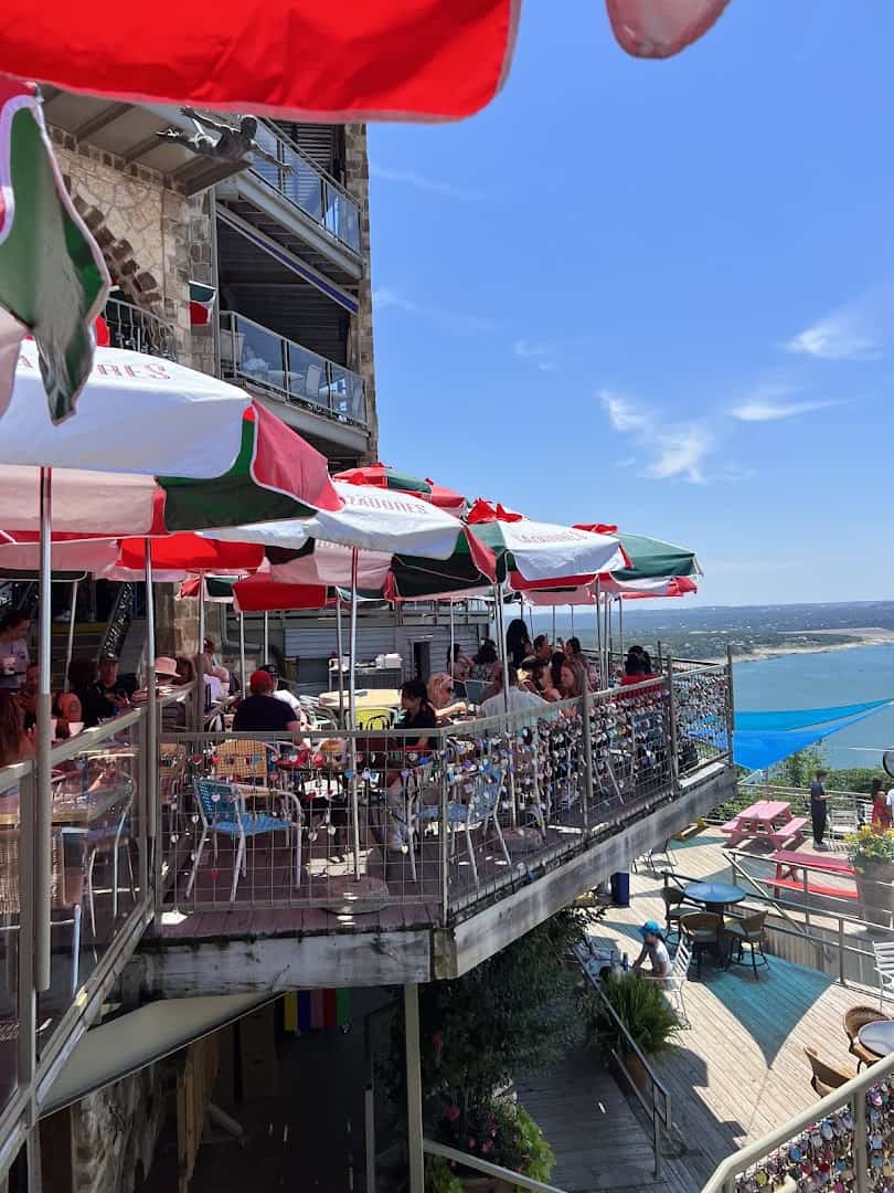 Umbrella-covered terraces overlooking Lake Travis at The Oasis in Austin