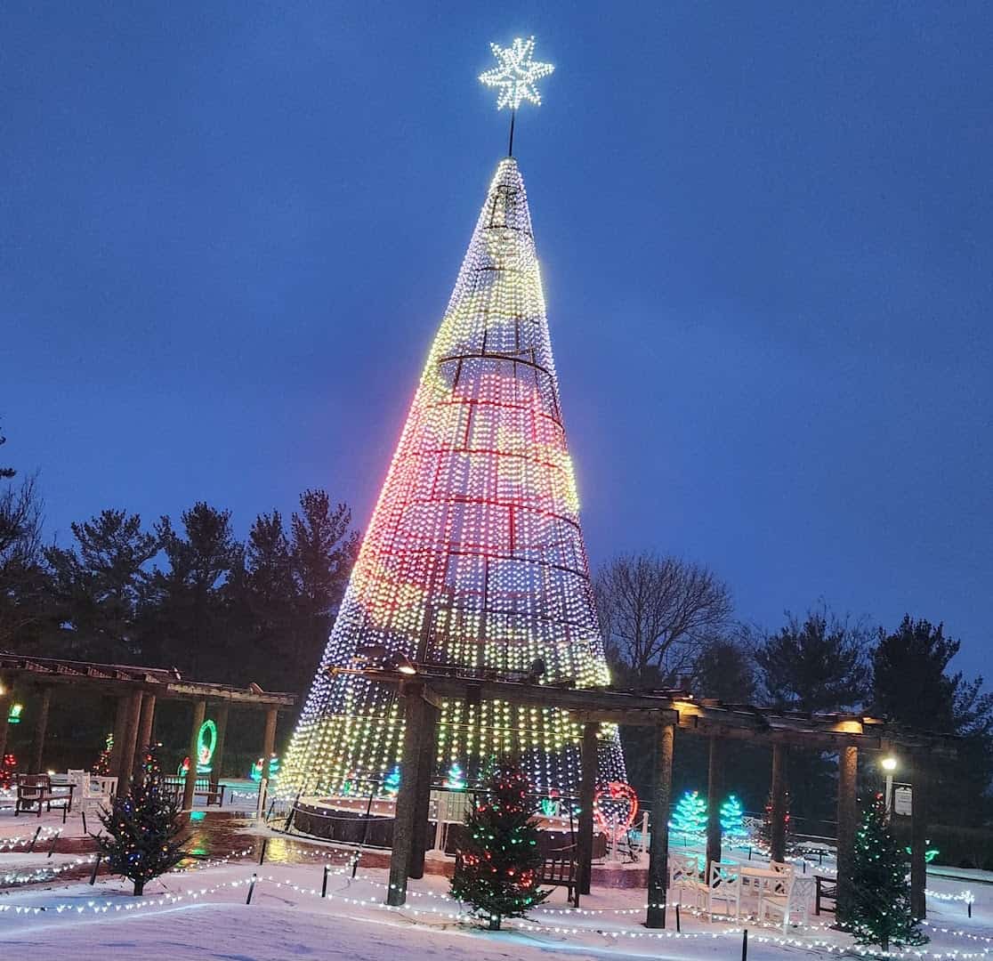 Giant illuminated Christmas tree at night at Oglebay Winter Festival of Lights in Wheeling, West Virginia