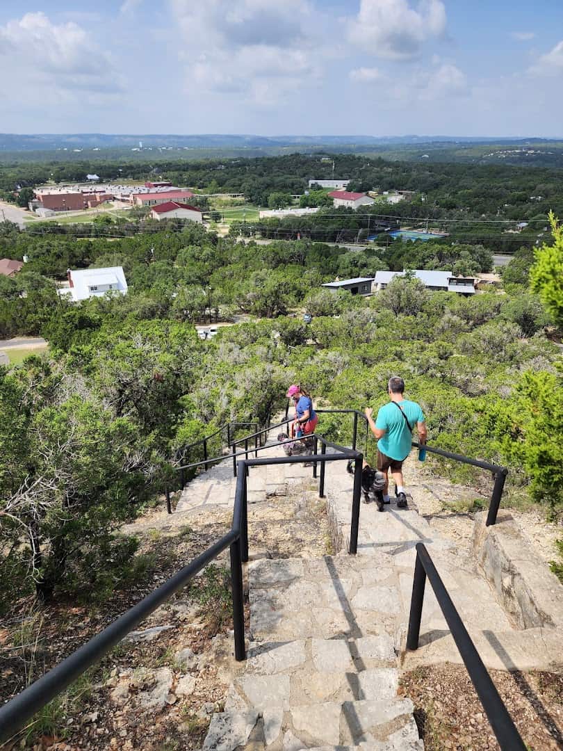 Stone steps with handrails climbing Old Baldy above the Wimberley valley