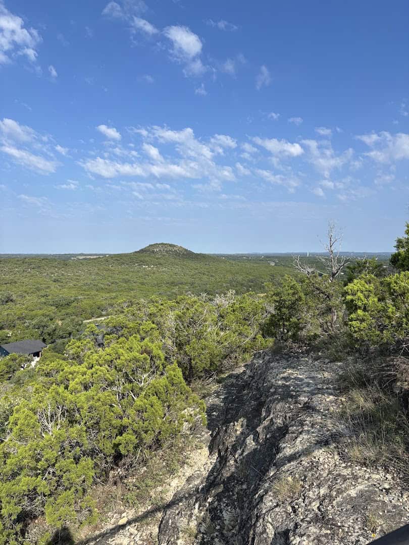 View across the Wimberley valley toward the matching twin hill from Old Baldy