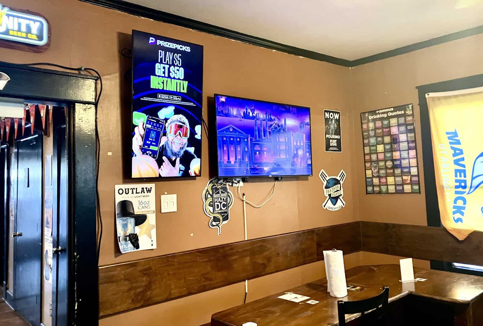 Inside the cozy dining room at Old School Pizza Tavern in Arlington, Texas