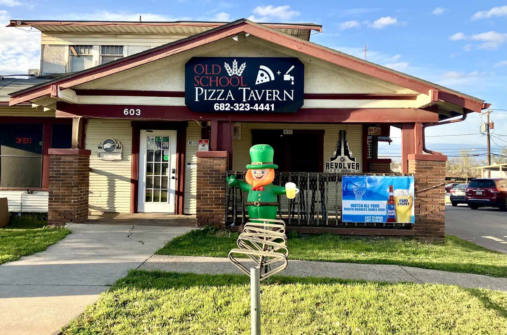 The little-house exterior of Old School Pizza Tavern in Arlington, Texas