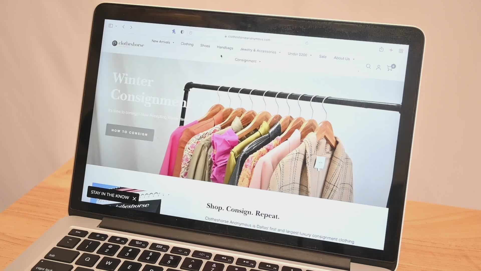 The Clotheshorse Anonymous online shop open on a laptop in Dallas