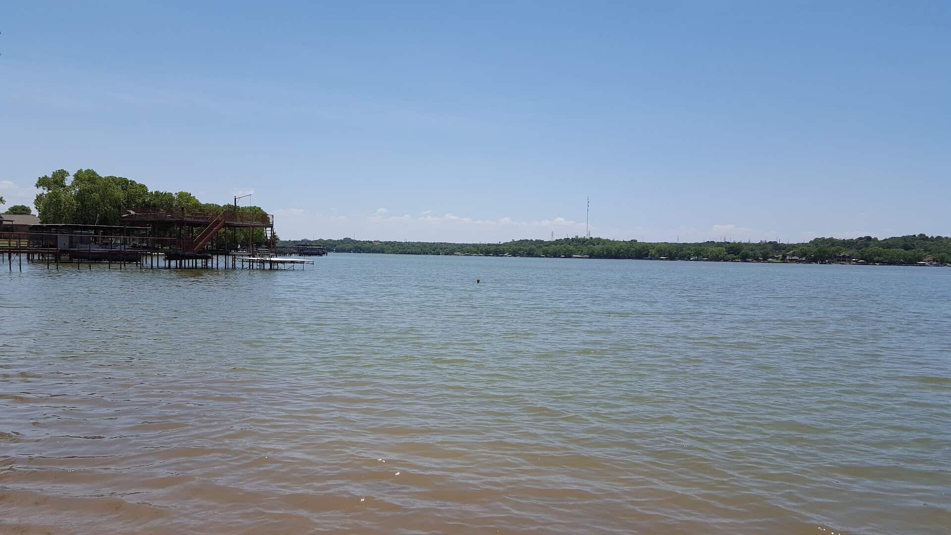 Open water and a tree island on Lake Weatherford in Weatherford, Texas