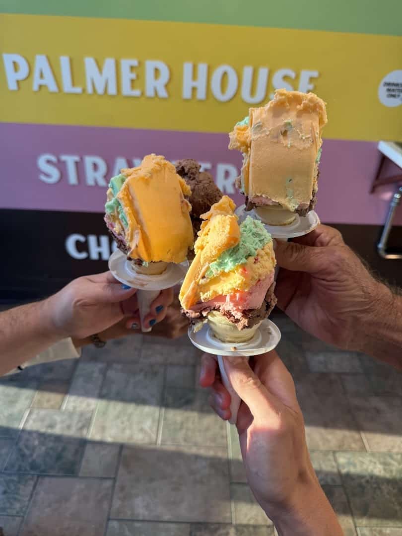 Layered five-flavor Rainbow Cones held up at The Original Rainbow Cone in Chicago, Illinois
