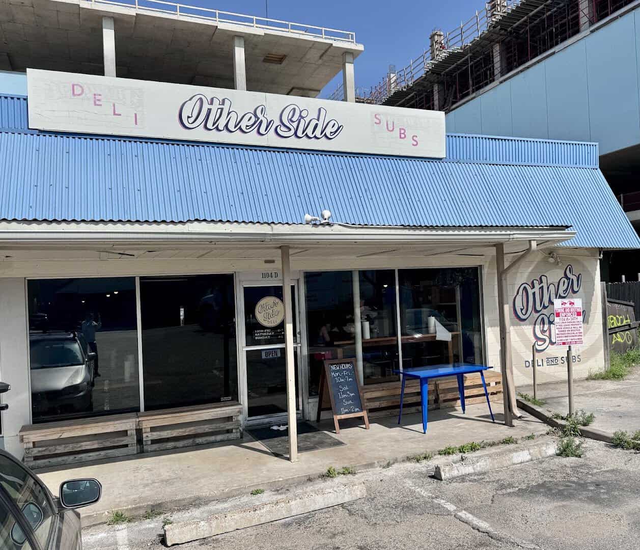 Otherside Deli storefront and sign on West 34th Street in Austin