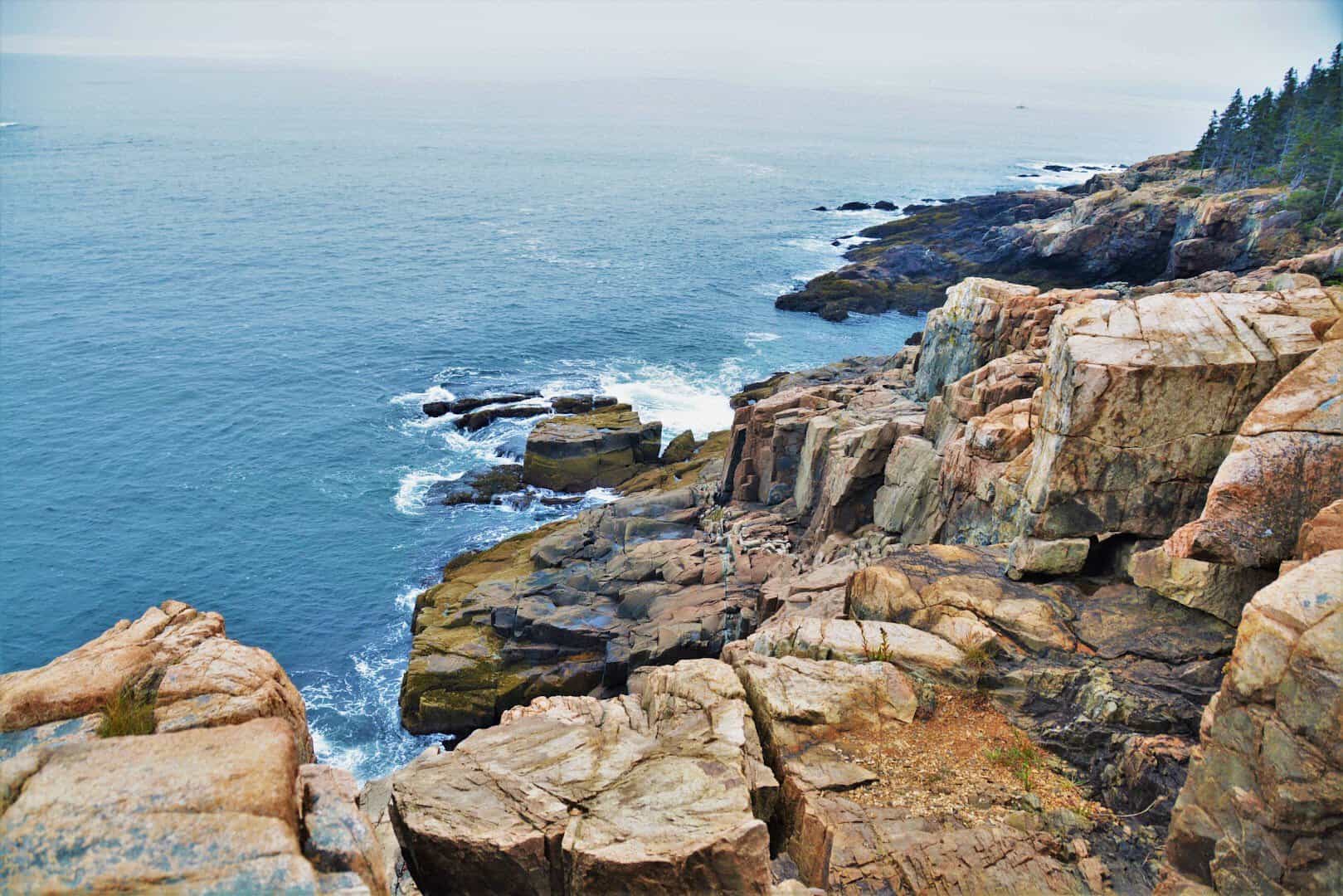 Rocky granite coastline and Atlantic Ocean at Otter Cliff in Acadia National Park, Maine
