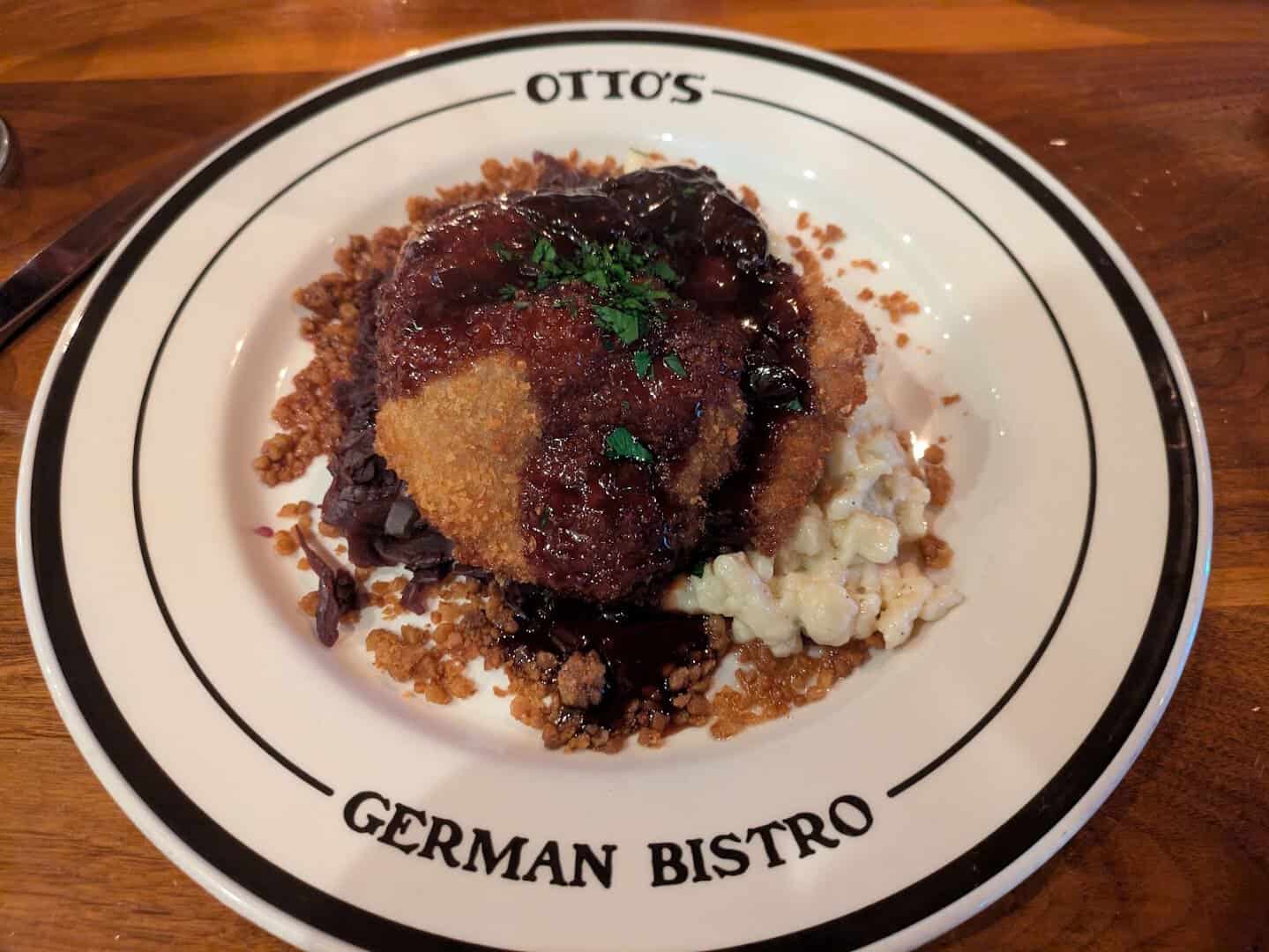 Crispy duck schnitzel over spaetzle with berry demi-glace at Otto's German Bistro in Fredericksburg